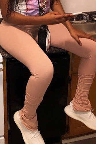 Pantaloni skinny pieghevoli casual in poliestere solido rosa