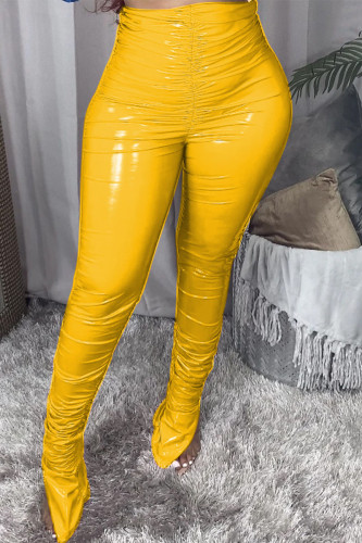 Pantaloni skinny con piega in tinta unita gialli