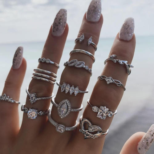 Quinze conjuntos de anéis moda prata