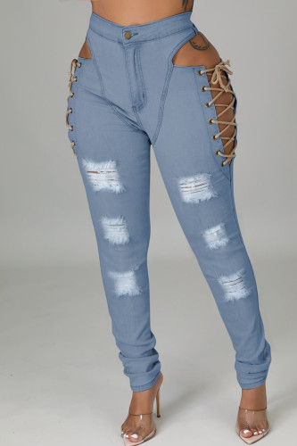Jeans skinny in denim a vita media con frenulo scavato in tinta unita sexy blu baby
